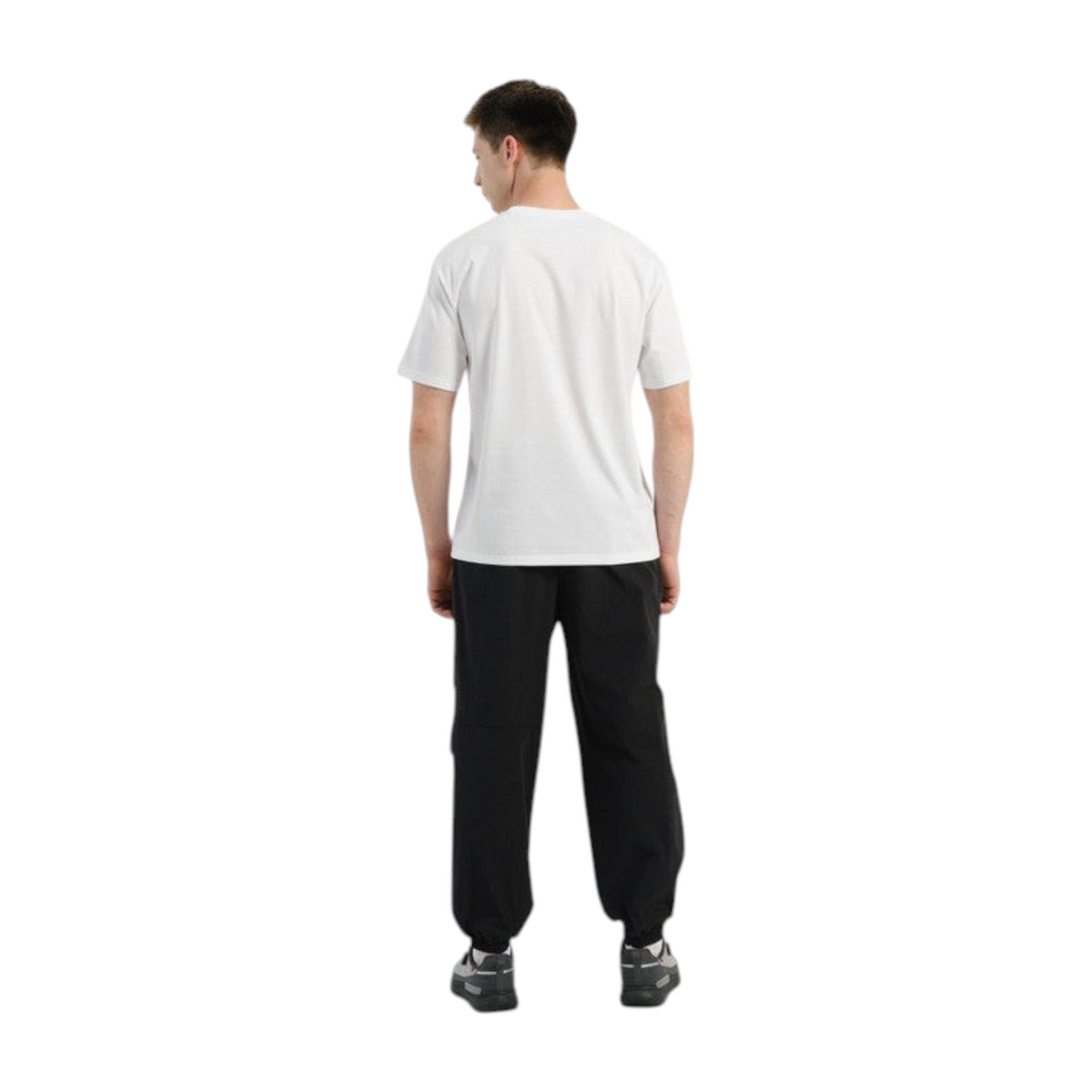 FRG COMMUTE relaxed black woven trousers worn by a man in a white t-shirt, back view