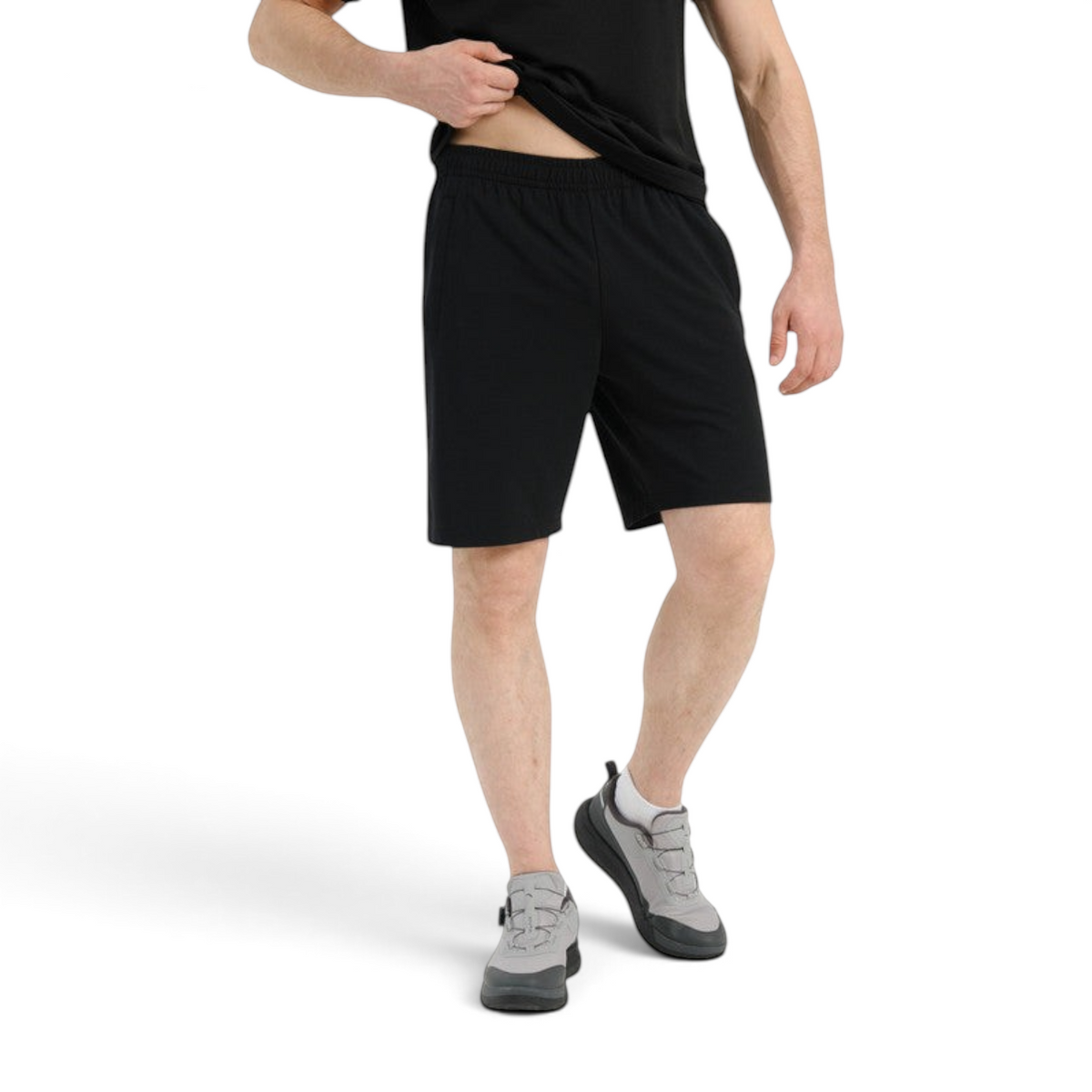 FRG Anta men's black knit training shorts with a regular fit, worn by a model against a white background.