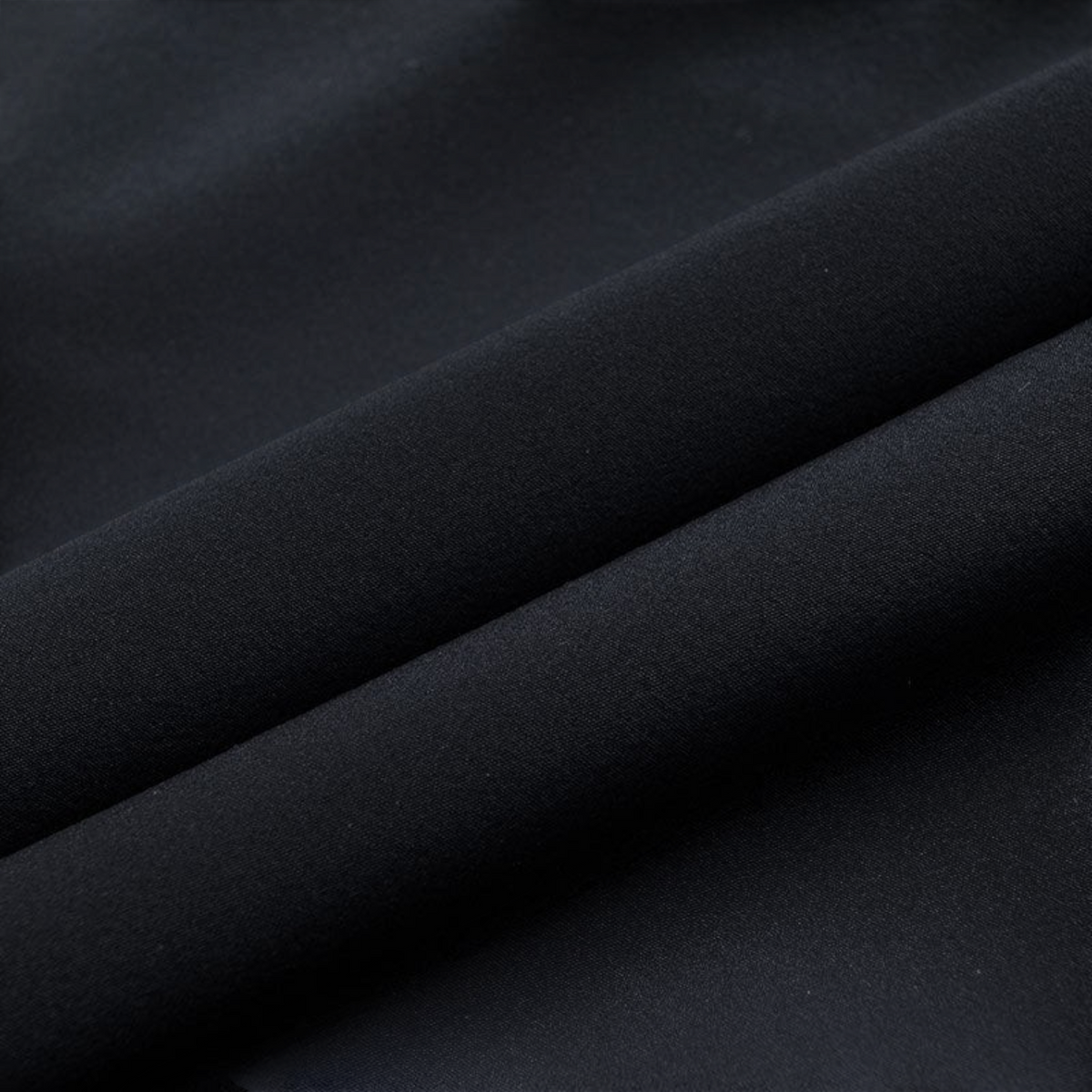 FRG ANTA Splash Express black woven fabric texture showing lightweight performance material detail