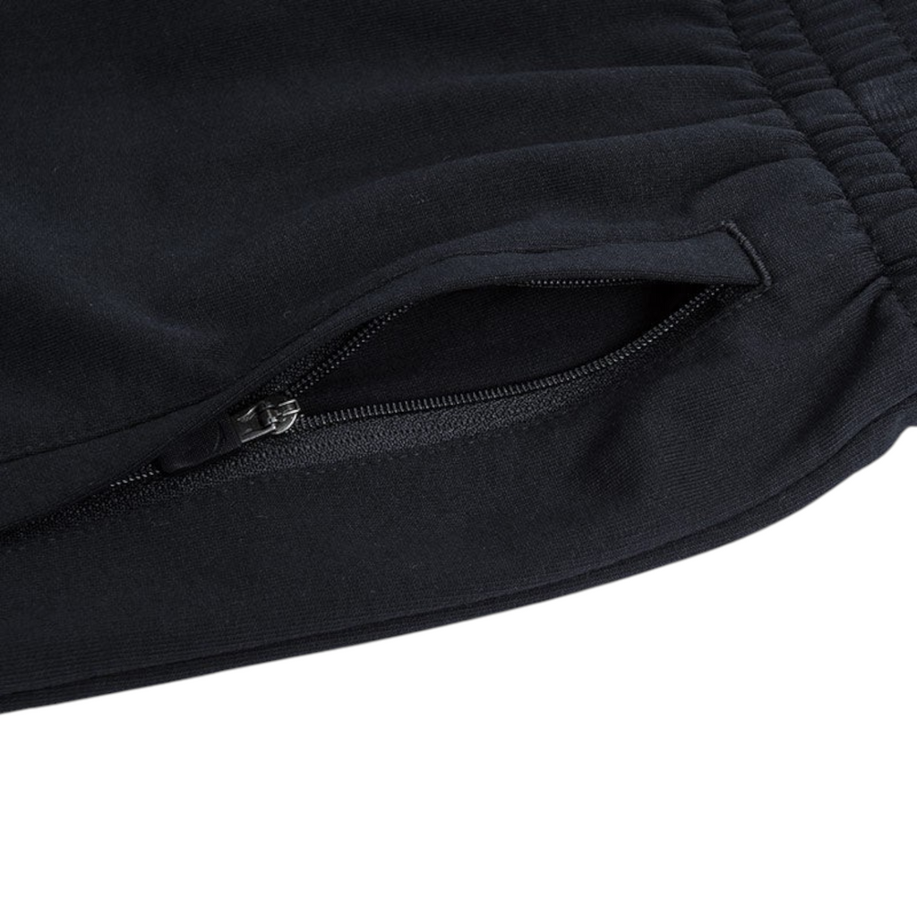 FRG black knit half pants featuring a secure zippered side pocket and comfortable elastic waistband
