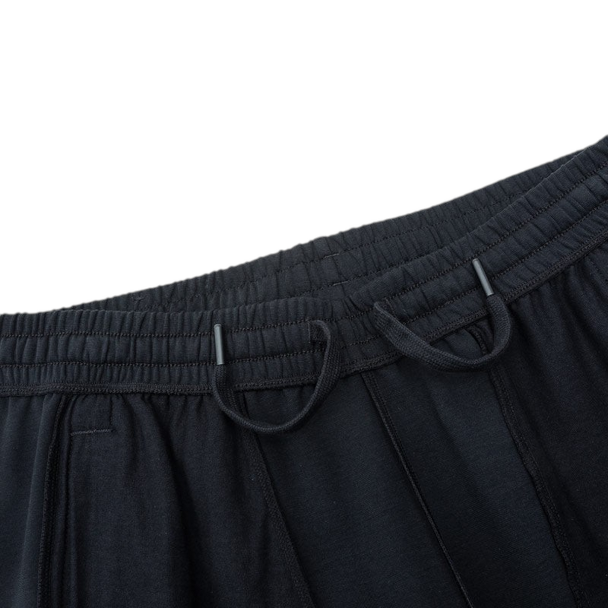 FRG ANTA Sorona black knit track pants featuring an elasticated drawstring waistband for a comfortable active fit.