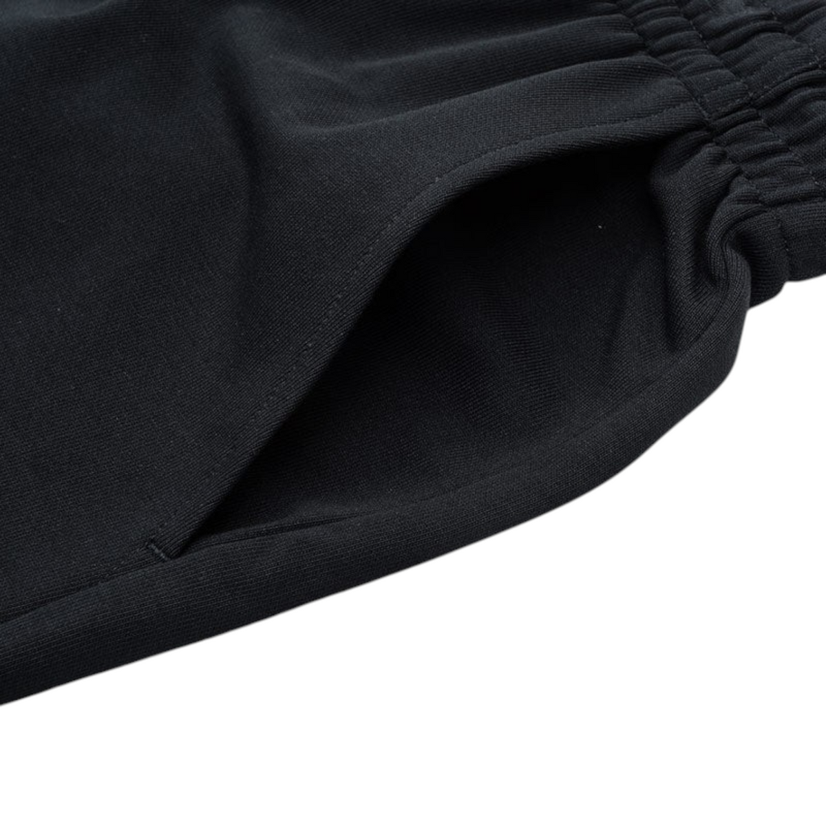 FRG ANTA black knit half pants featuring a soft cotton-blend fabric and a comfortable elasticated side pocket detail.