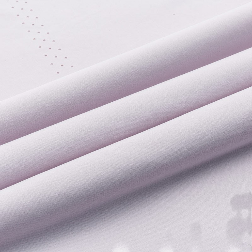 FRG light purple SS TEE fabric close-up showing smooth texture and subtle perforated dot pattern detail