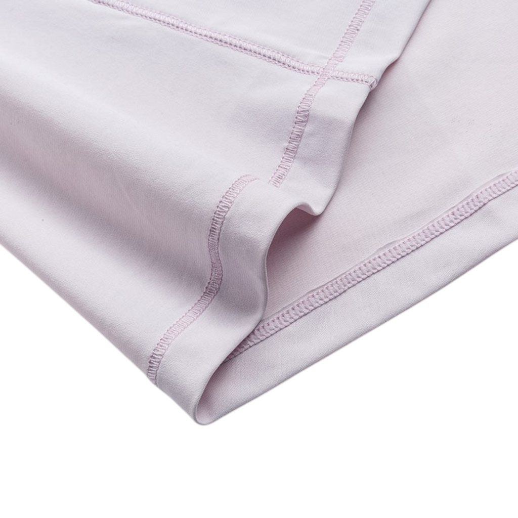 Close-up of a light lavender FRG SS TEE showing smooth fabric texture and reinforced stitched hem detail.