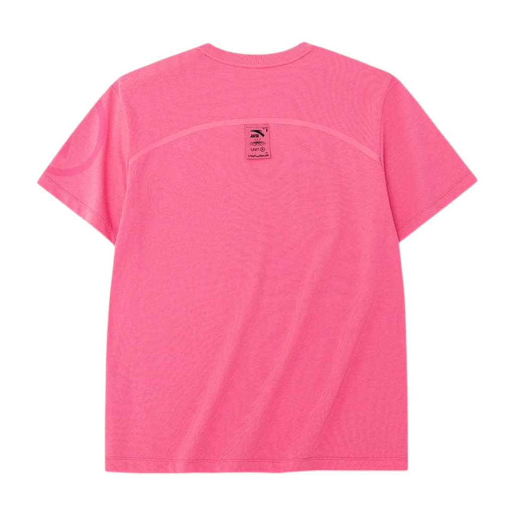 Back view of a bright pink FRG short sleeve t-shirt with a small black logo patch on the upper back