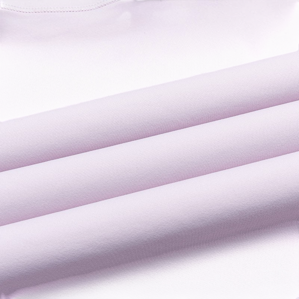 Close-up of smooth light purple fabric texture from an FRG SS TEE showing high-quality material detail
