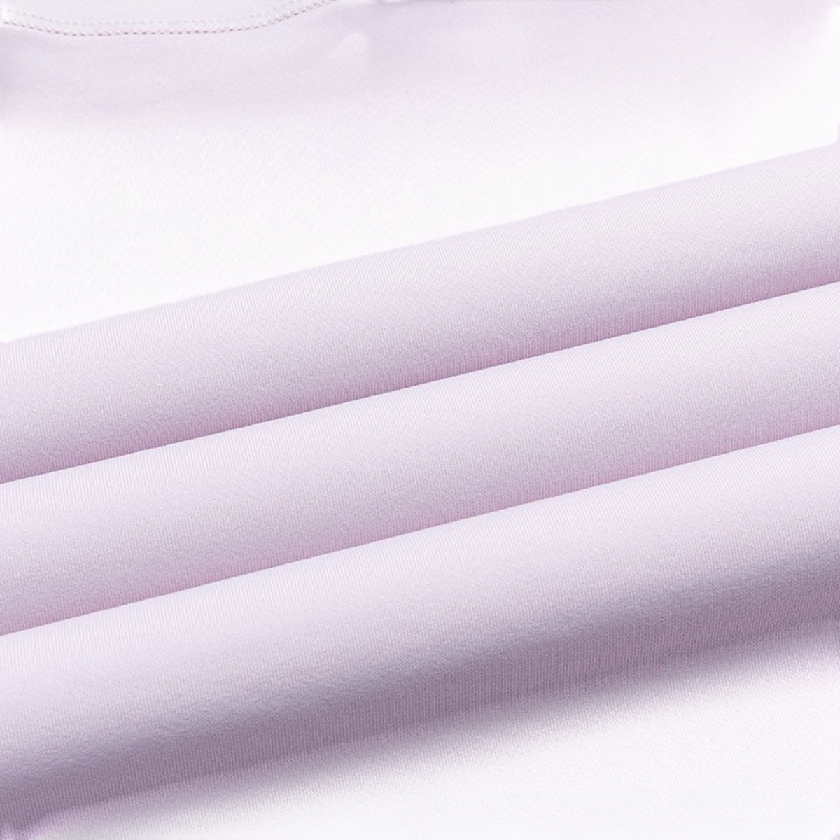 Close-up of smooth light purple fabric texture from an FRG SS TEE showing high-quality material detail