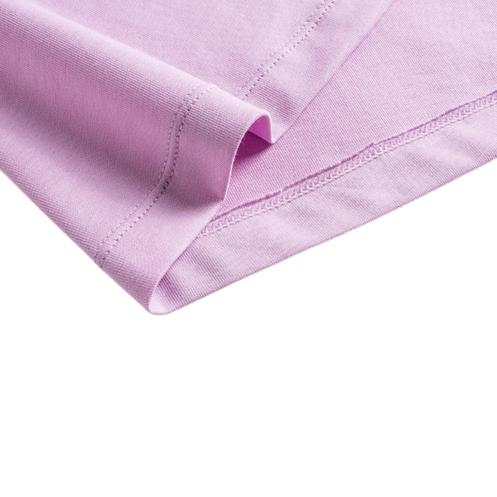 Close-up of the hem of a light purple FRG SS TEE showing smooth cotton fabric and detailed stitching.