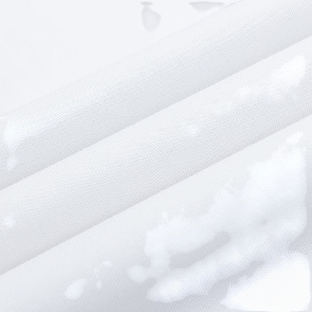 Close-up of FRG SS TEE white cotton fabric showing smooth texture and soft folds