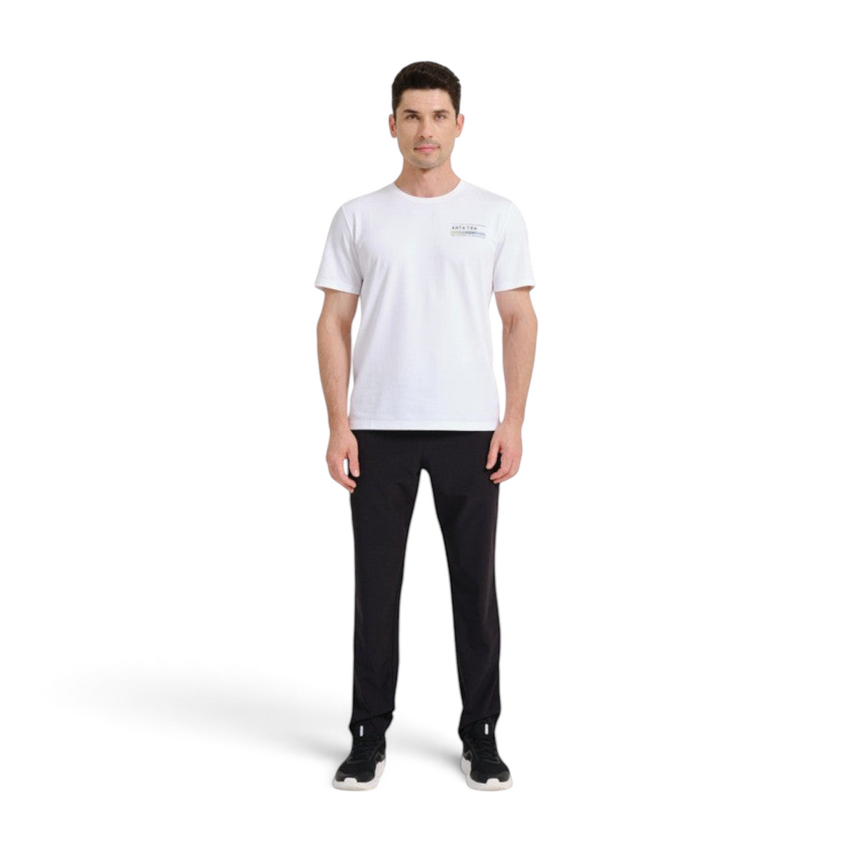FRG model wearing ANTA black woven track pants and a white t-shirt for athletic training and everyday active wear.