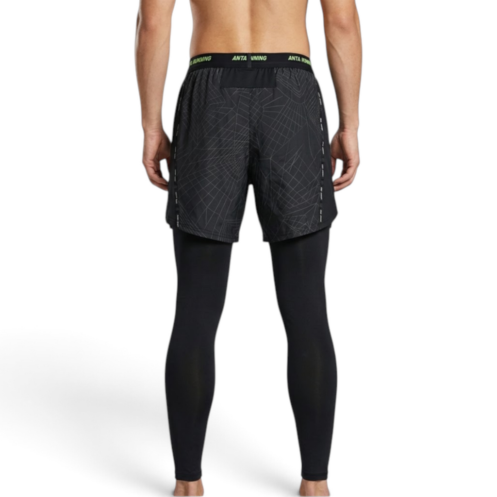 FRG ANTA black running shorts with integrated compression leggings, featuring a geometric pattern and elastic waistband