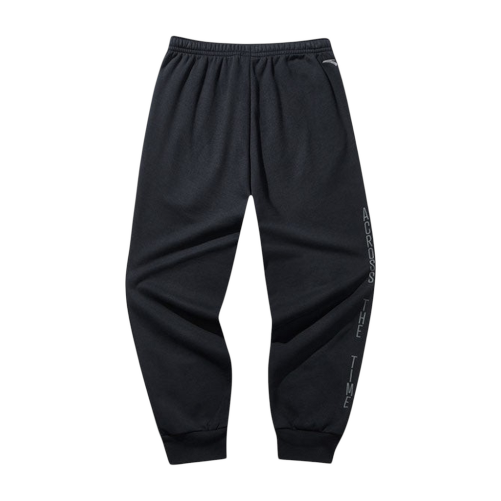 FRG black knit track pants with elasticated cuffs and Across The Time text detail on the leg