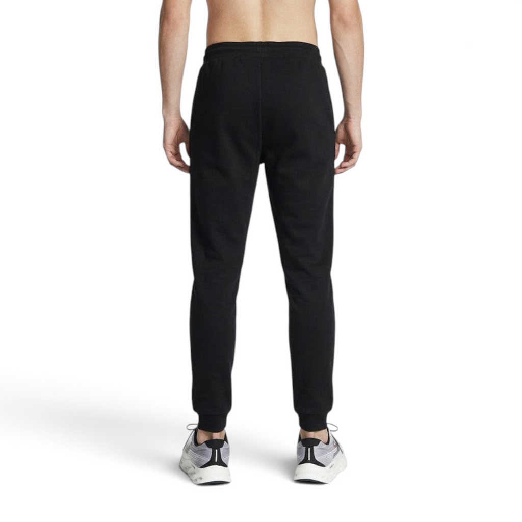 FRG ANTA Dream Black knit track pants for kids, featuring a comfortable stretch fit, shown from the back view.