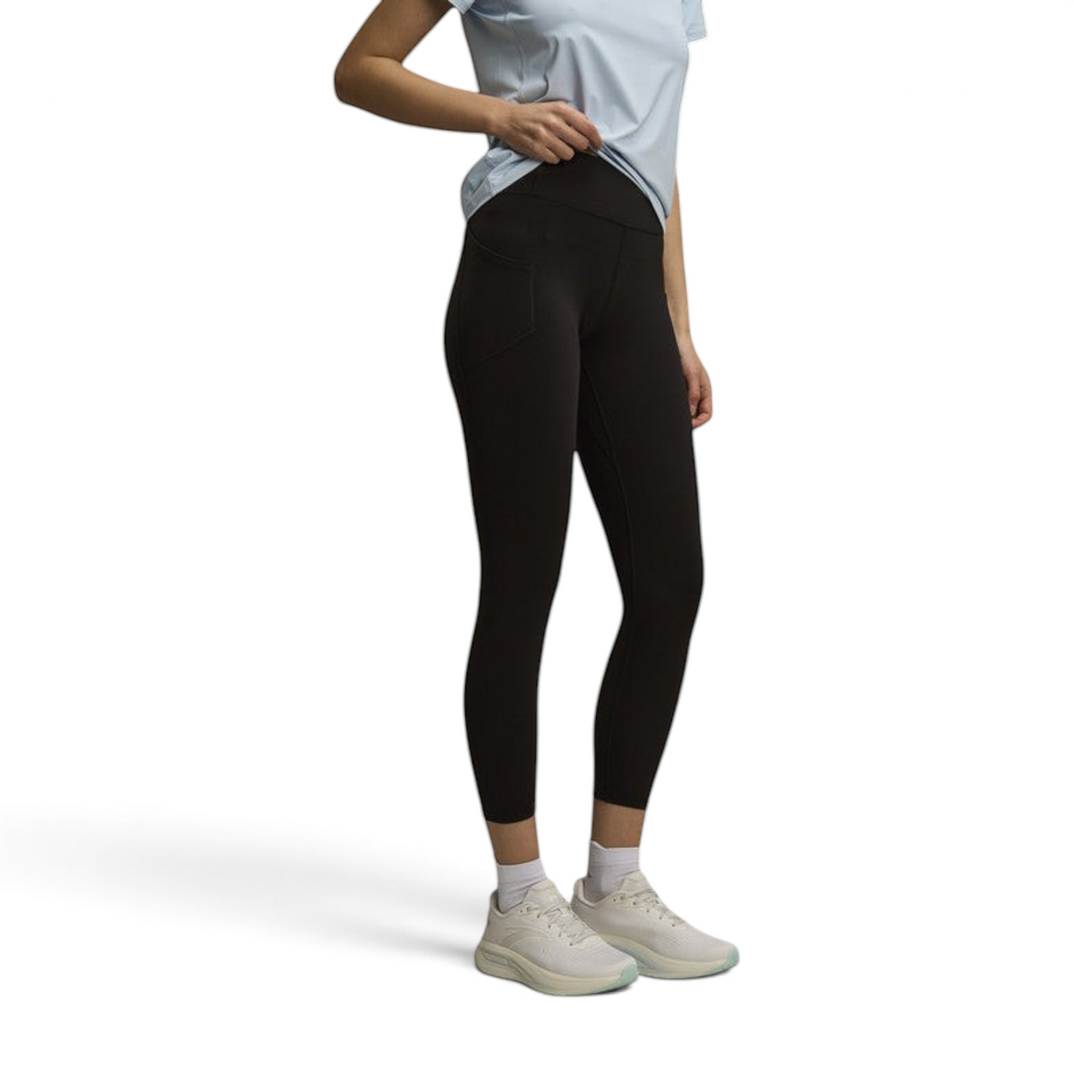 FRG Anta Pro women's black cropped training leggings with side pocket, worn with white sneakers
