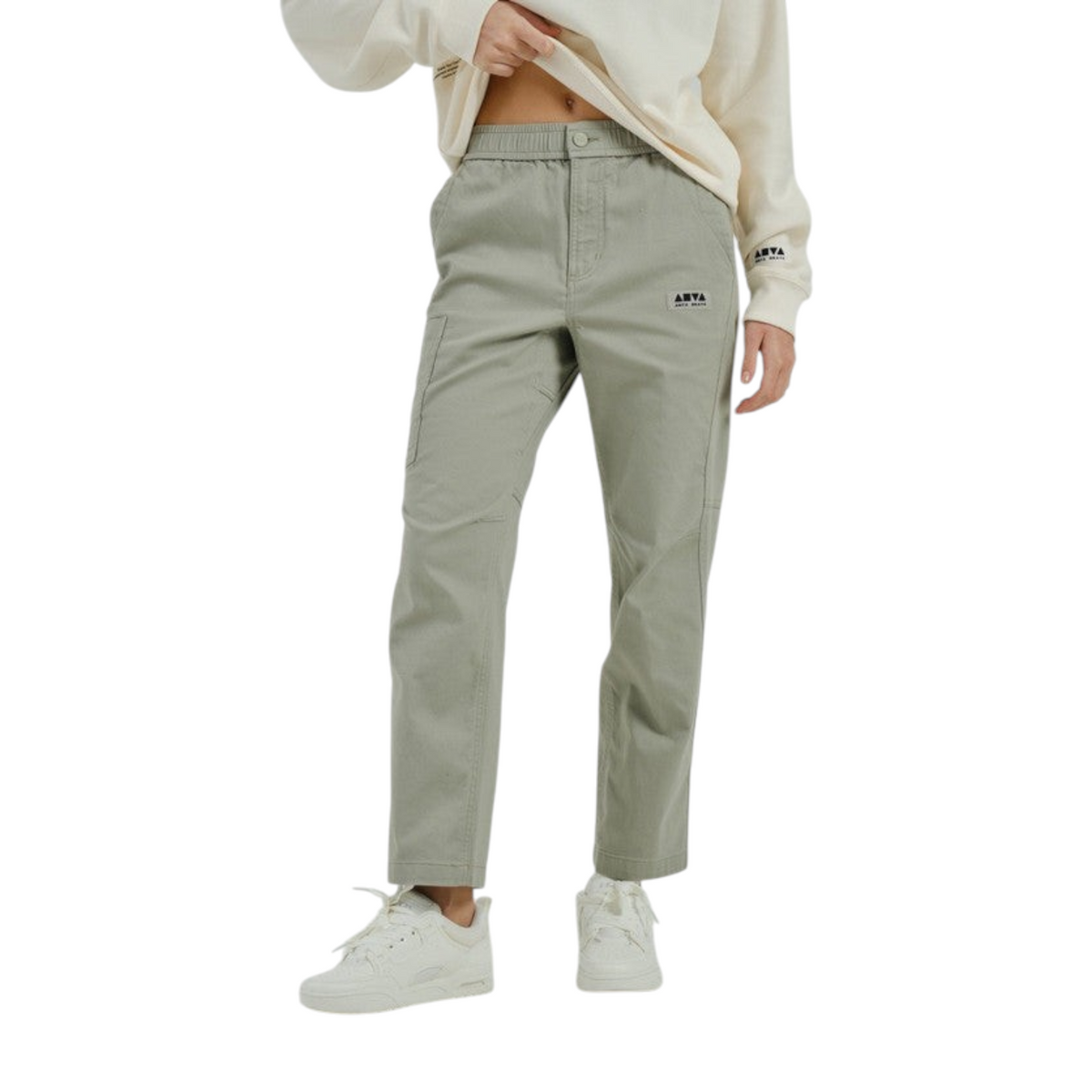 FRG Anta SKATE sage green woven casual pants with an elastic waistband and small logo patch on a model