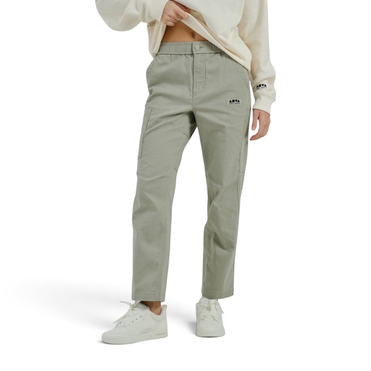 FRG Anta SKATE sage green woven casual pants with an elastic waistband and small logo patch on a model