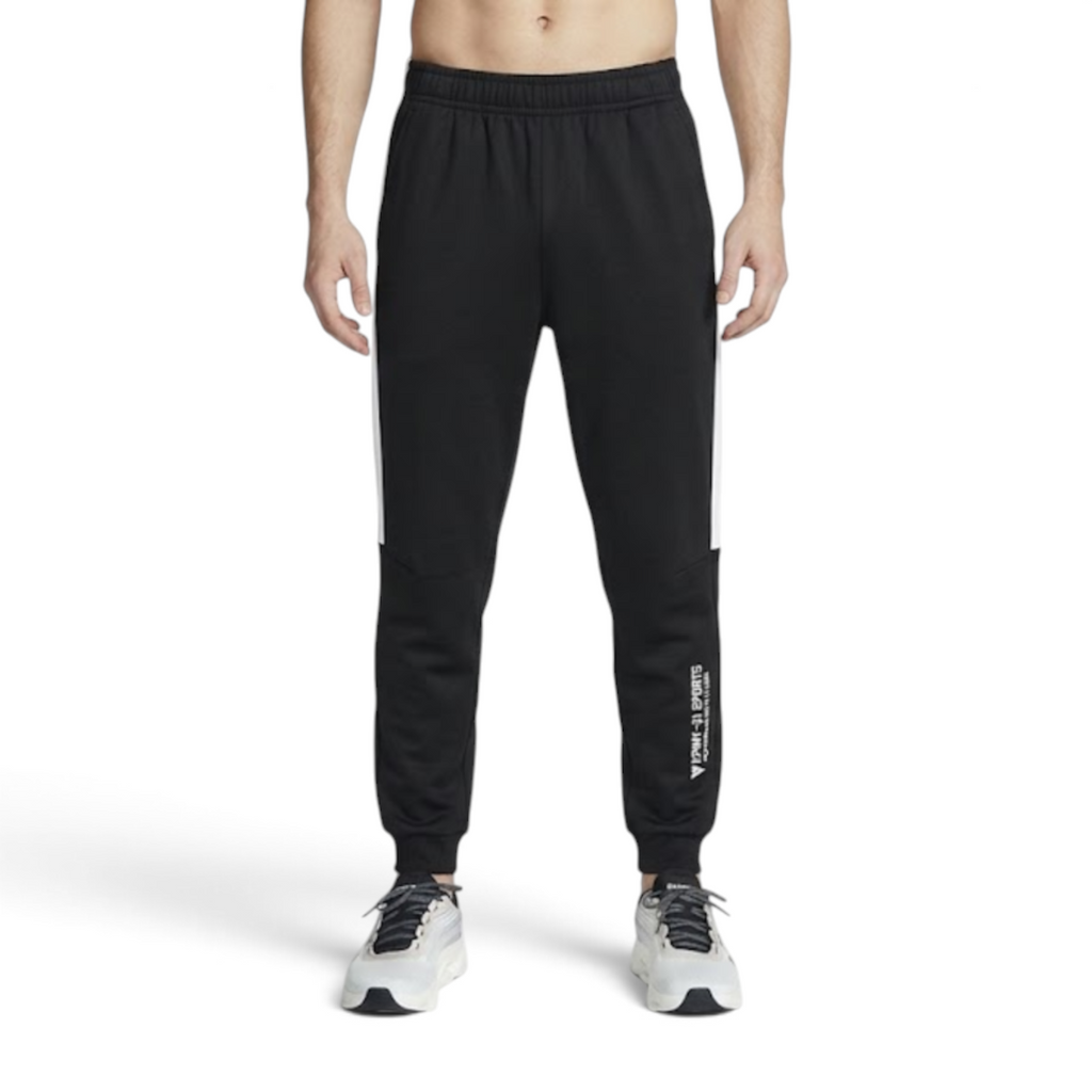 FRG ANTA black and white woven track pants with side stripes and logo detail worn by a model