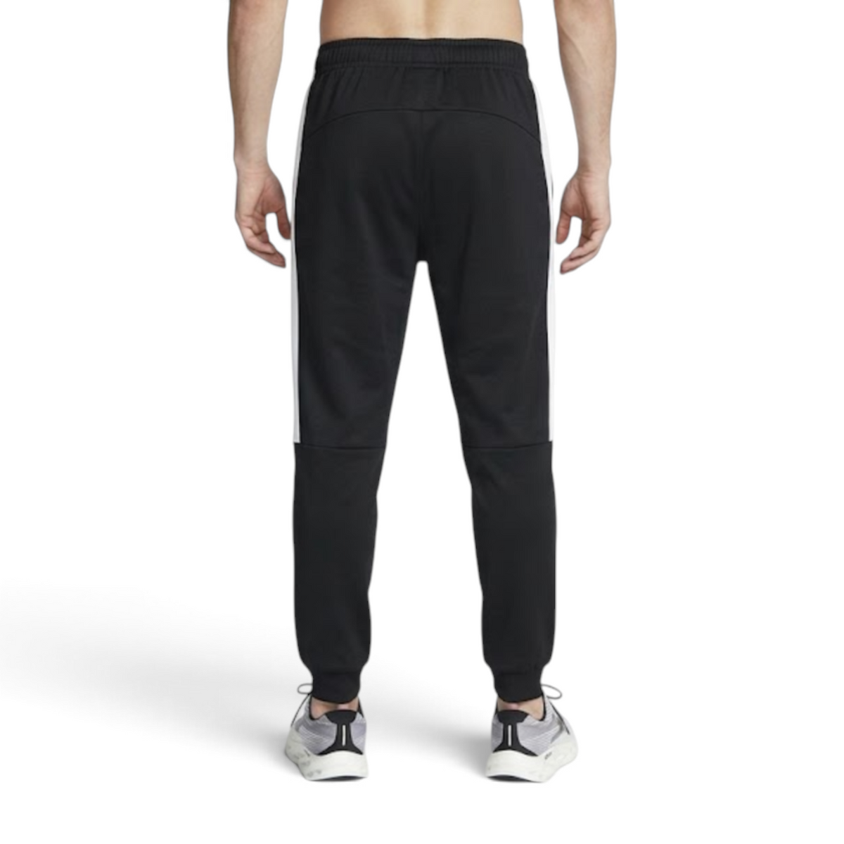 FRG ANTA black and white woven track pants on a person from the back view showing athletic fit and cuffed ankles