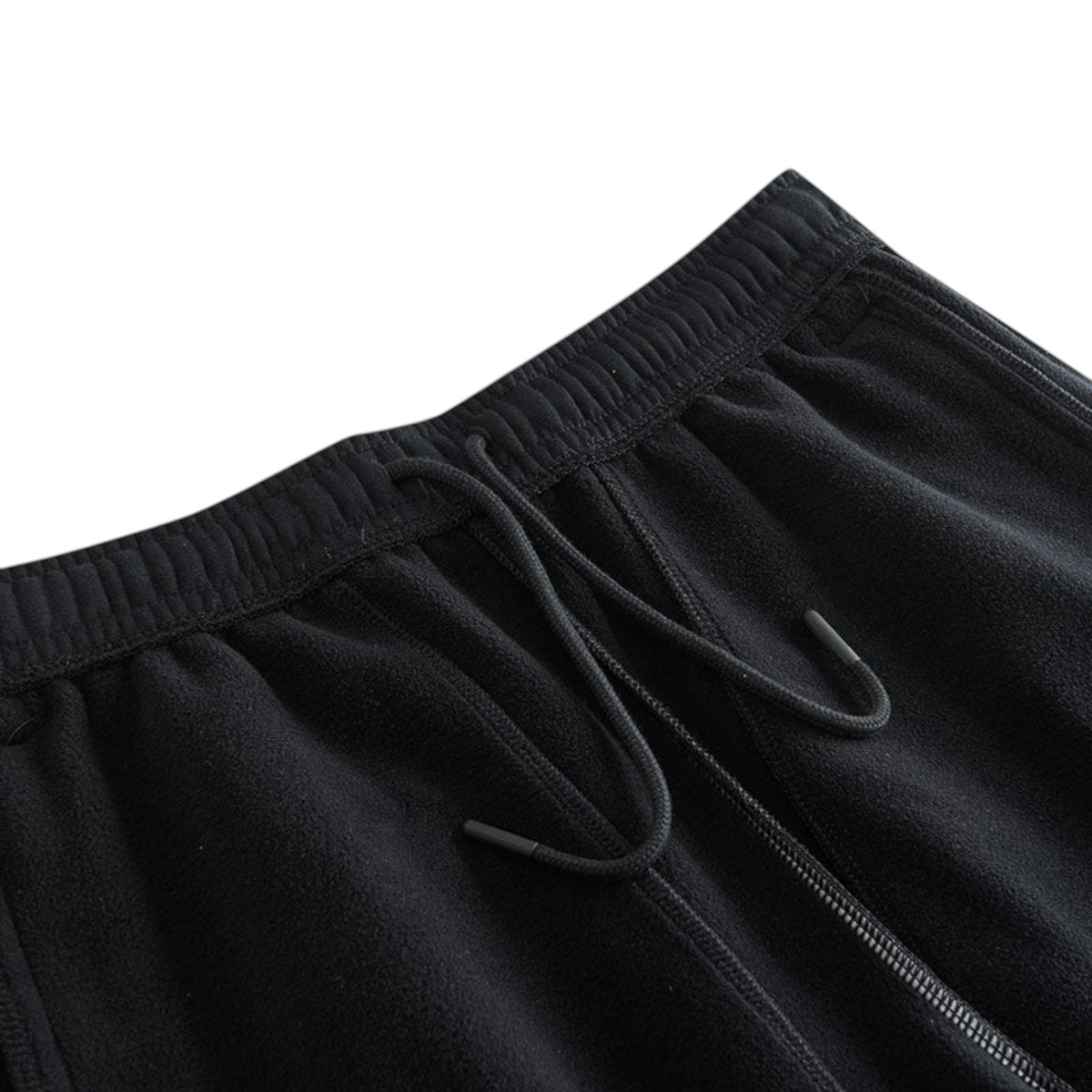 FRG black knit track pants featuring an elastic waistband with a matching drawstring closure