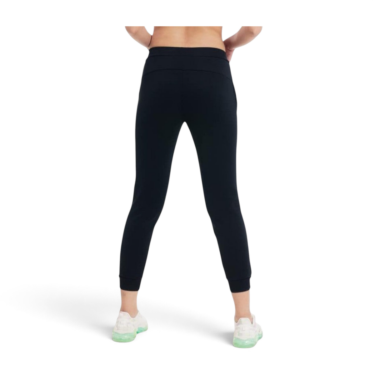 FRG ANTA black knit ankle training pants with four-way stretch fabric, viewed from the back on a model.