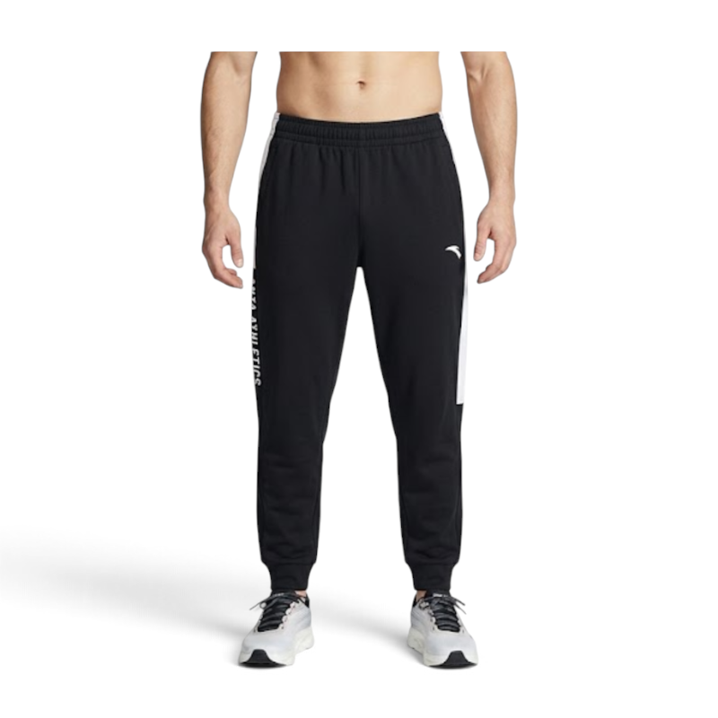 FRG ANTA black knit track pants with white side stripe detail worn by a model for training and casual wear.