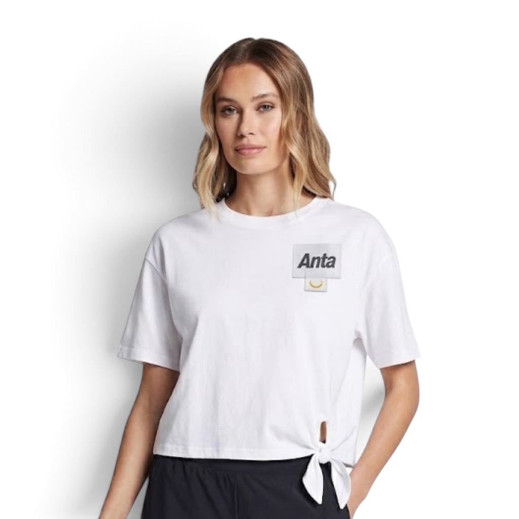 FRG ANTA snow white short sleeve t-shirt with A-Chill Touch fabric and a side tie detail worn by a model