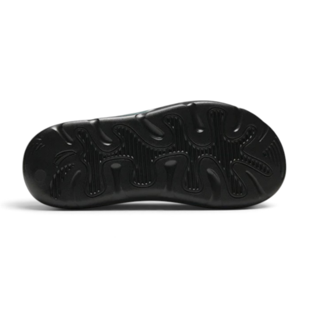 FRG Anta men's lifestyle slipper showing the black textured rubber outsole with a wave-like grip pattern