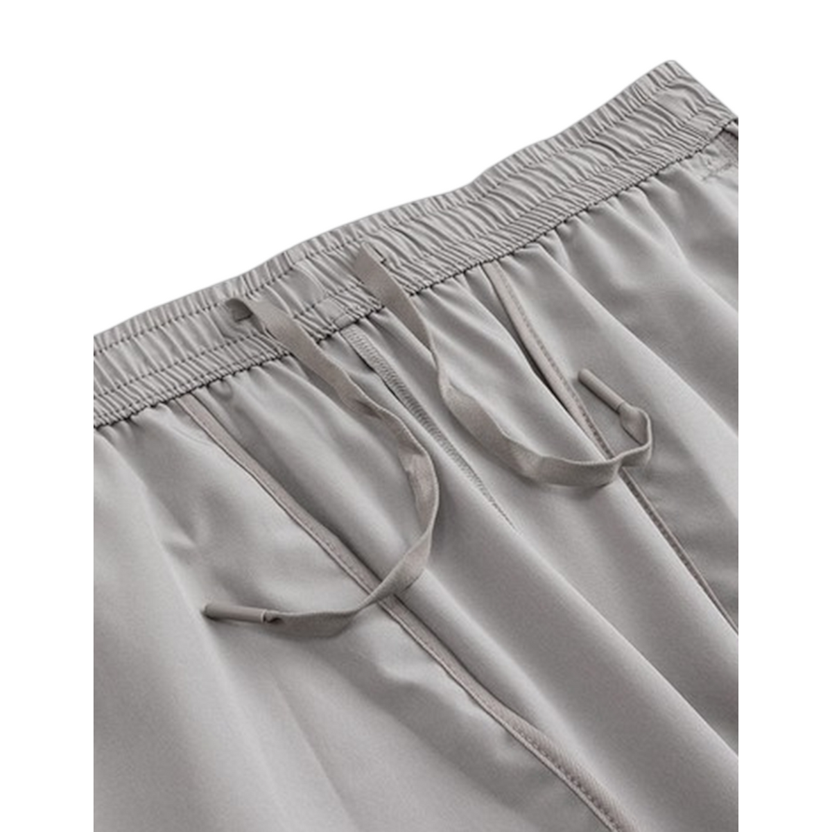 FRG Anta smoke grey woven training shorts featuring an elasticated waistband with adjustable drawstring closure.