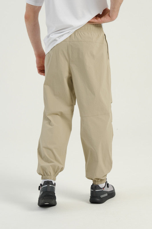 COMMUTE Woven Track Pants