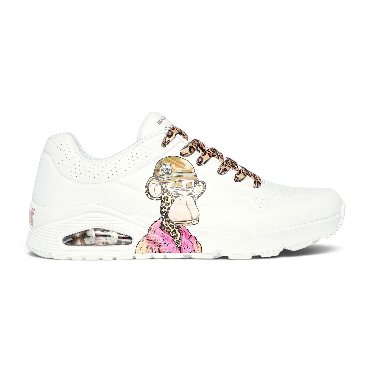 FRG UNO Dr. Bombay white sneakers featuring a monkey graphic, leopard print laces, and a cushioned air sole unit.