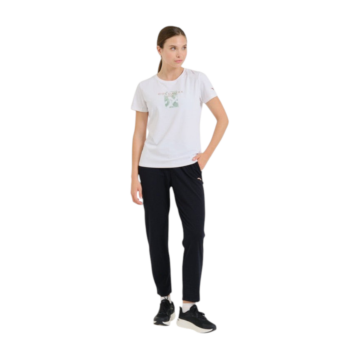 FRG model wearing a white ANTA cross training short sleeve t-shirt with a graphic print and black athletic pants