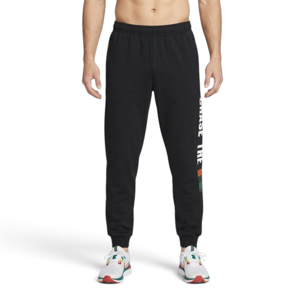 FRG ANTA Spotlight black knit track pants with white logo detail on the leg worn by a male athlete