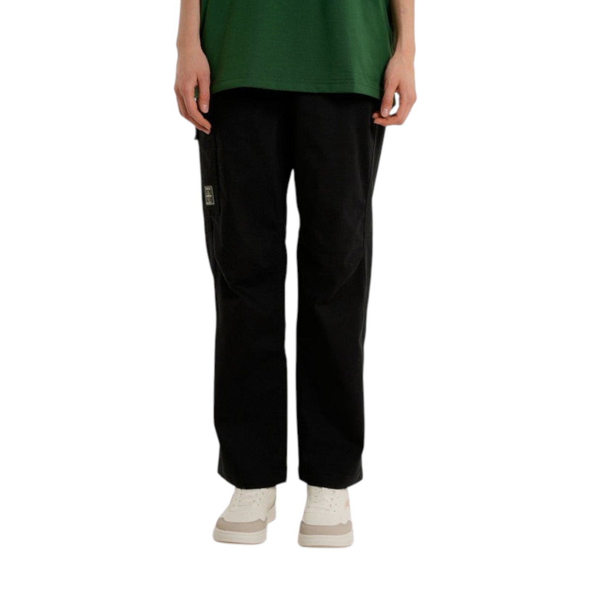 FRG ANTA SKATE black woven casual cargo pants with side pockets and a relaxed fit worn with white sneakers