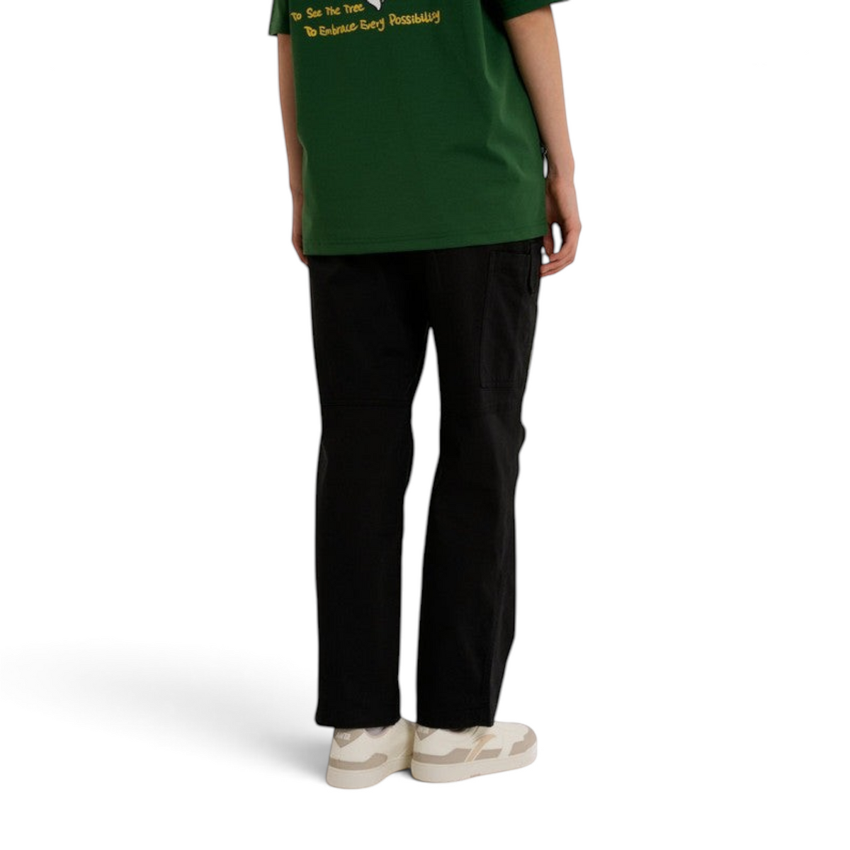 FRG ANTA SKATE woven casual pants in black, featuring a durable street-ready design worn with a green t-shirt