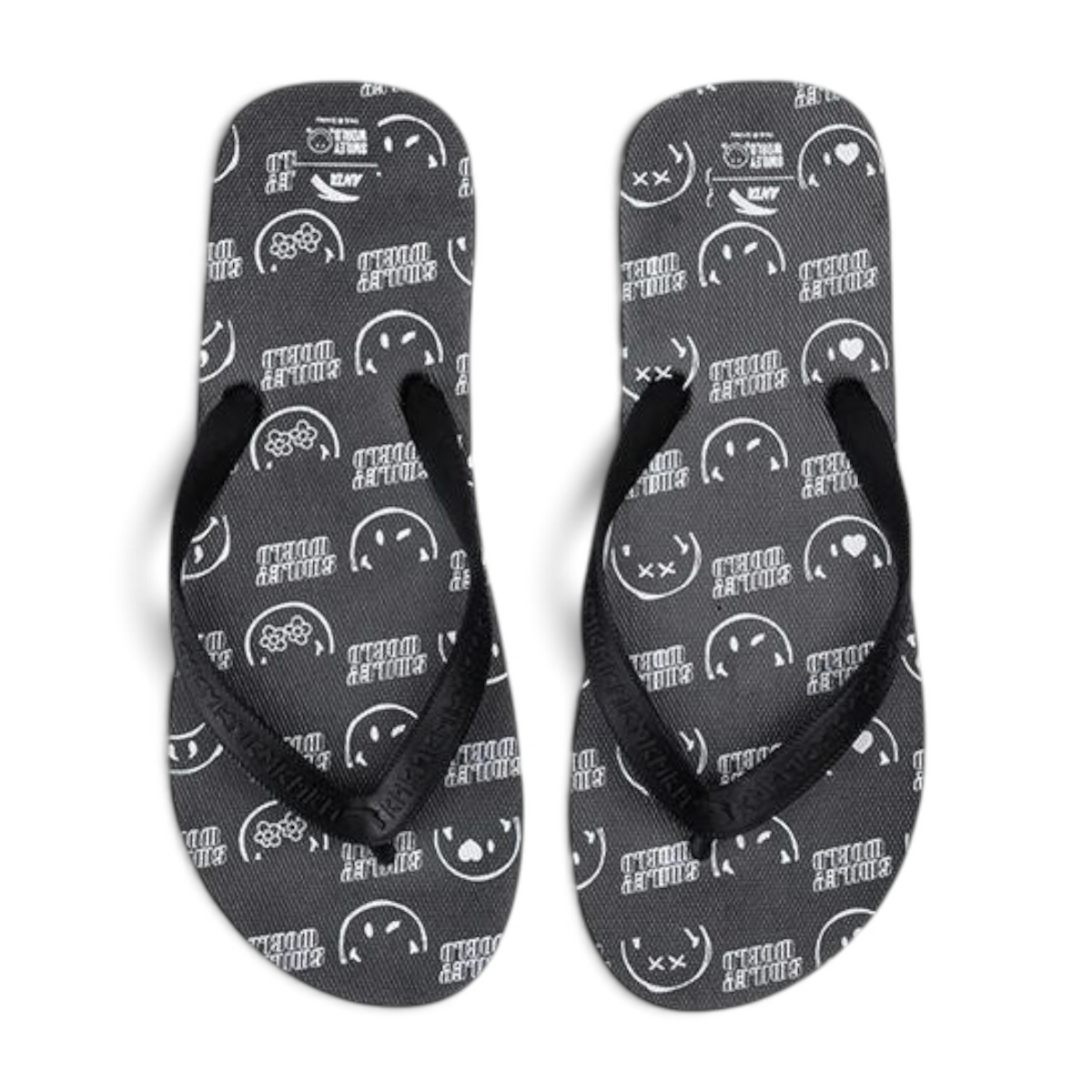 FRG beach slippers in black and white featuring a playful Smiley World all-over print pattern