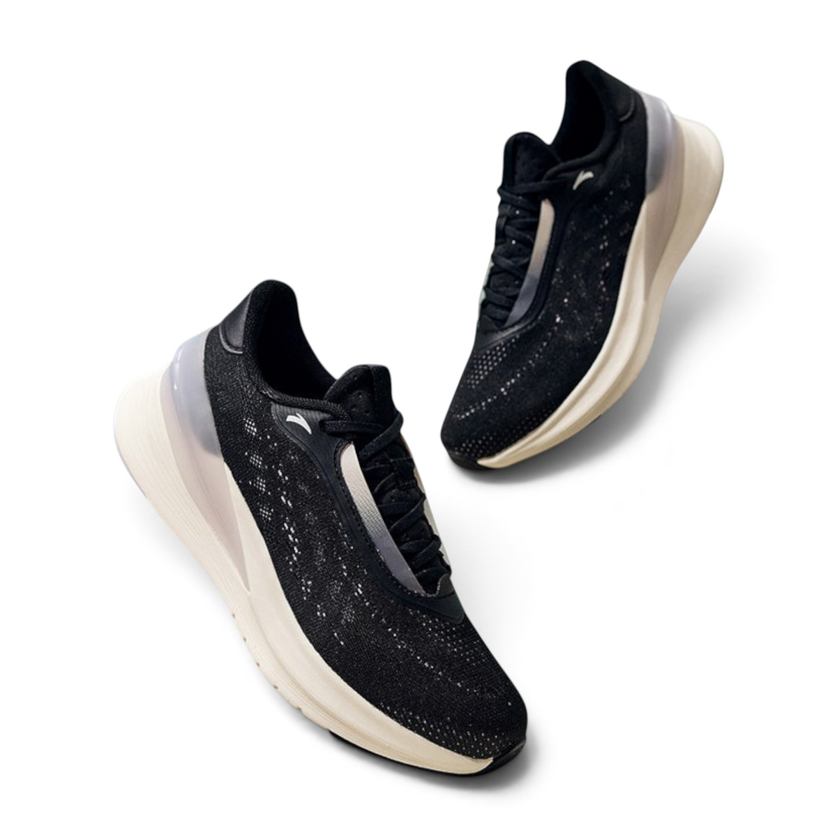 FRG running shoes in black with a white cushioned sole and breathable mesh upper, displayed in a floating studio shot
