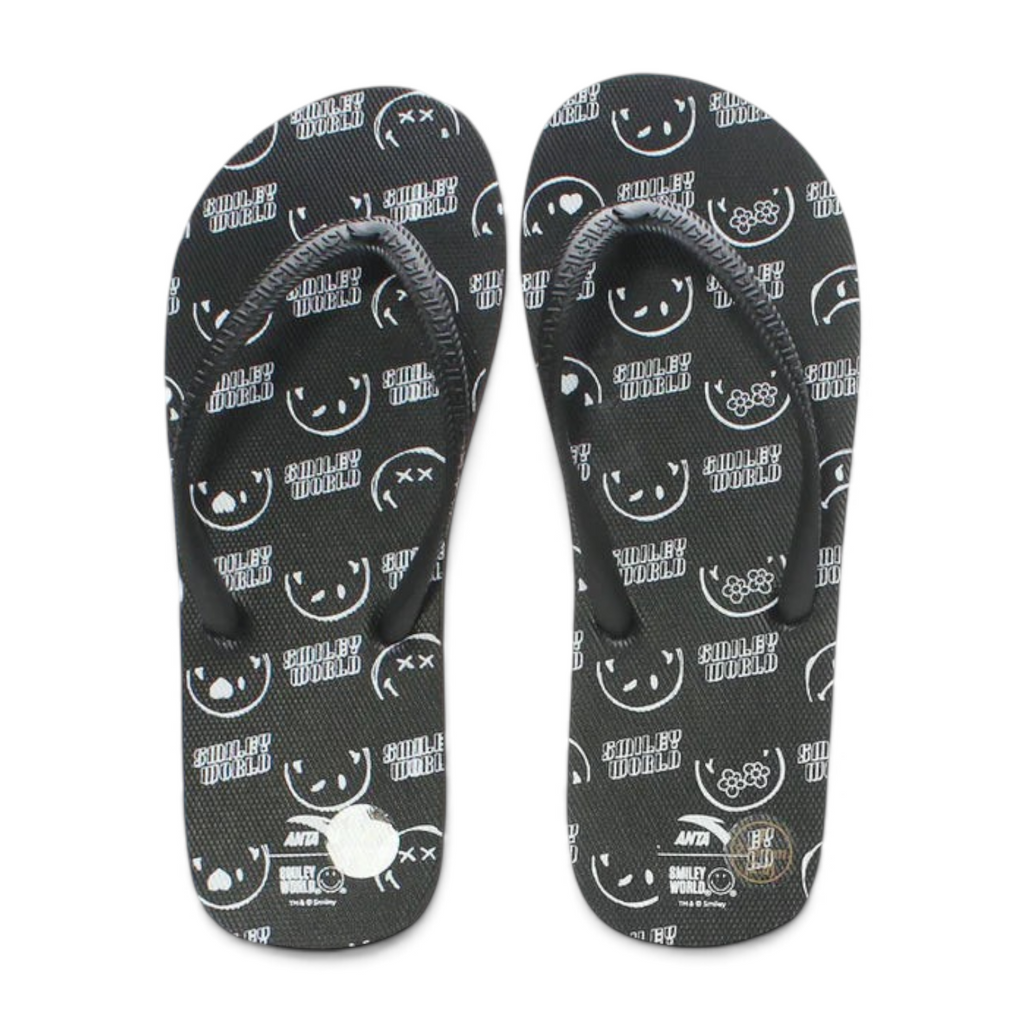 FRG black beach slippers featuring a white Smiley World graphic print pattern and black thong straps