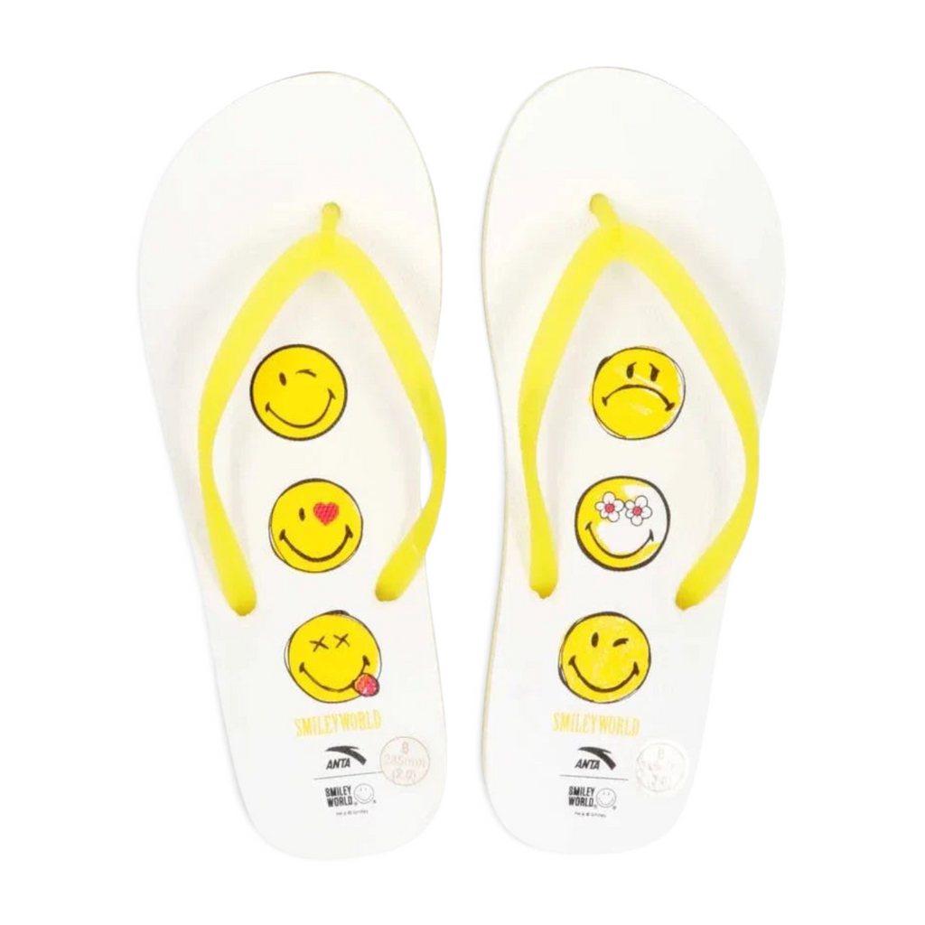 FRG white beach slippers featuring yellow straps and various SmileyWorld emoji prints on the footbed