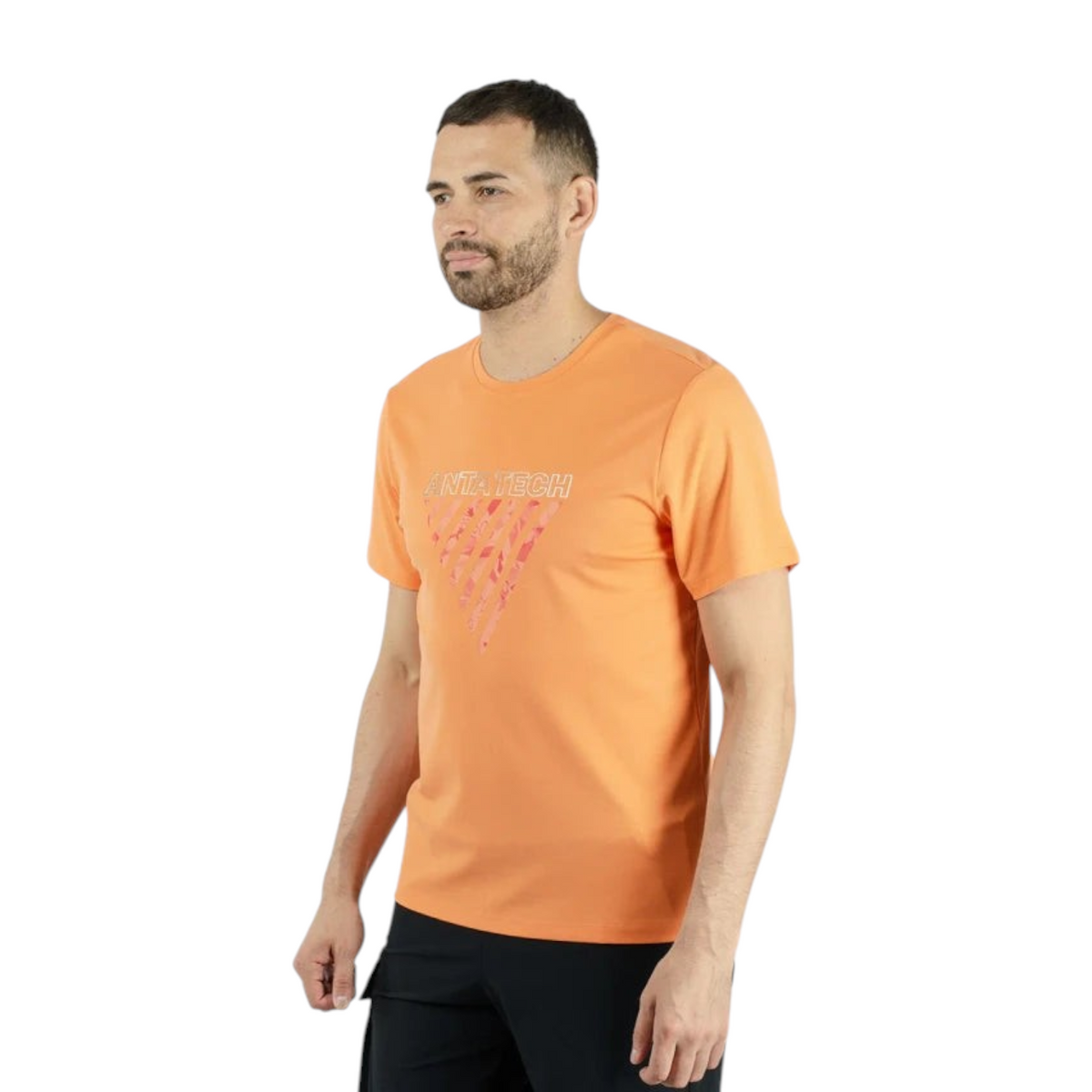 FRG Anta Training T-shirt in bright orange with a graphic chest print, worn by a man for moisture-wicking comfort.