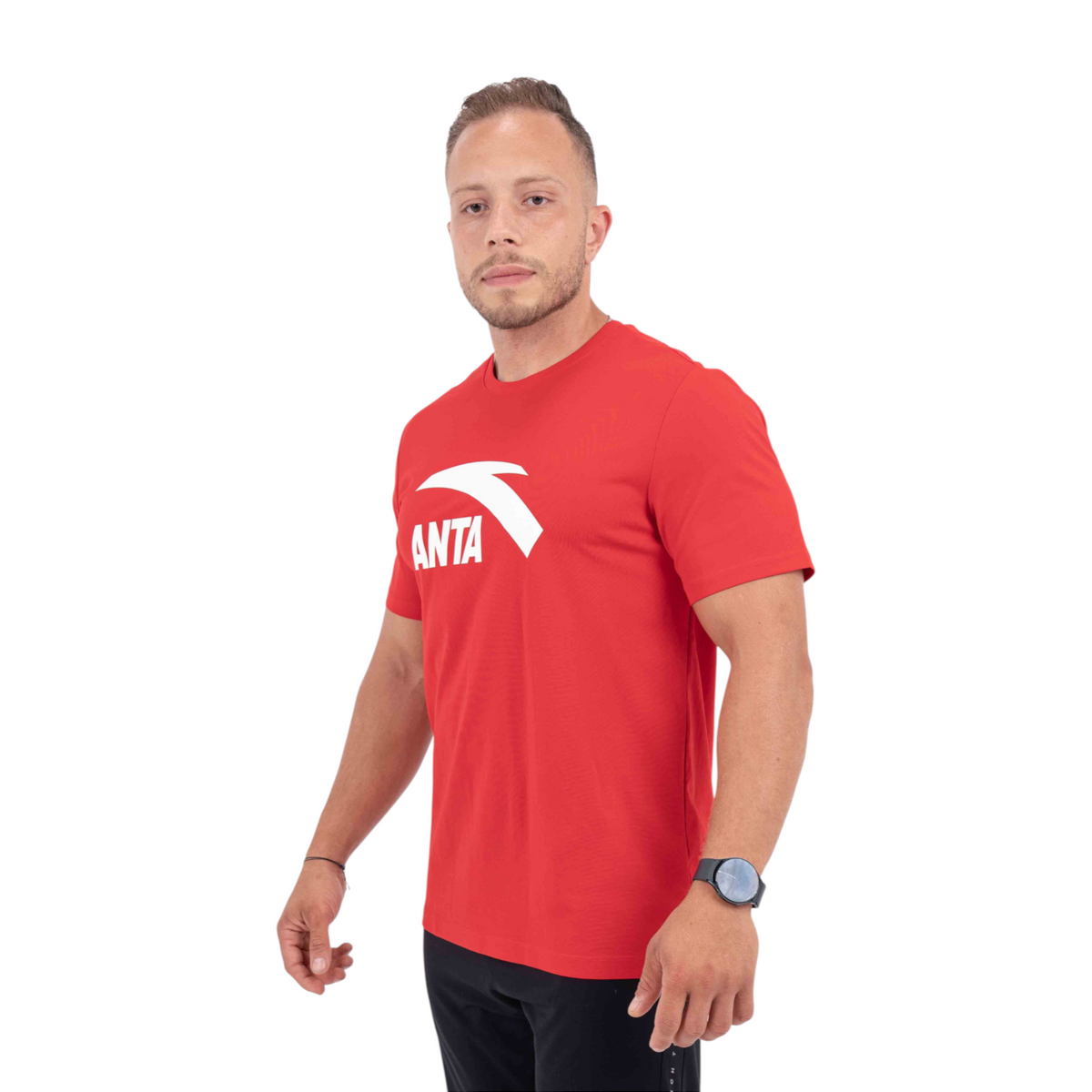 A man wearing a red FRG cross training t-shirt with a white logo on the chest, standing against a white background.