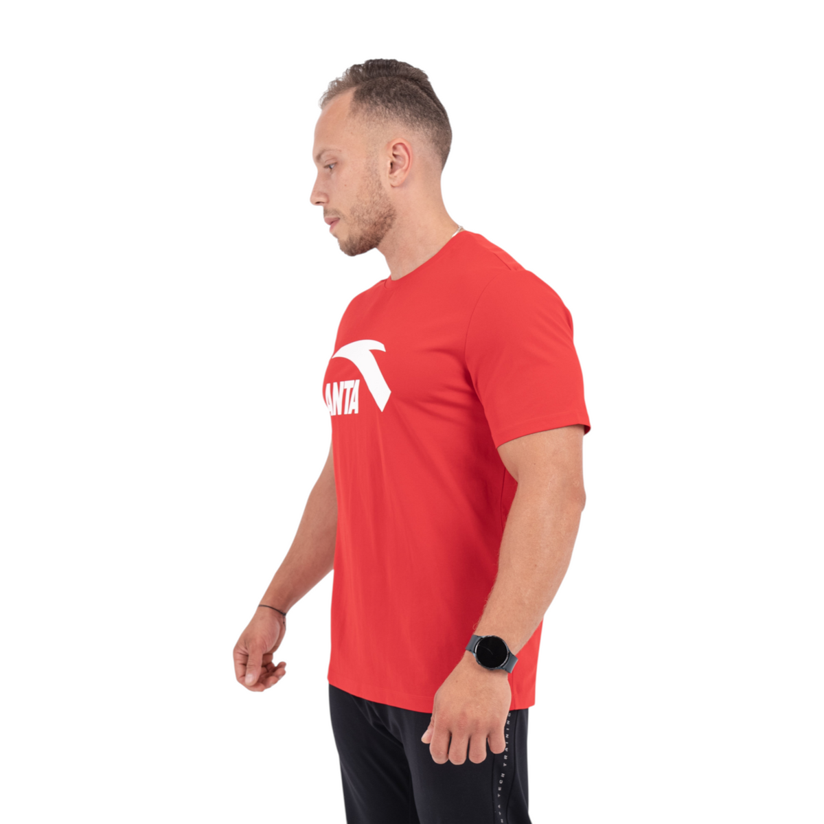 FRG red short-sleeve cross training t-shirt with white logo print worn by a man in a studio setting