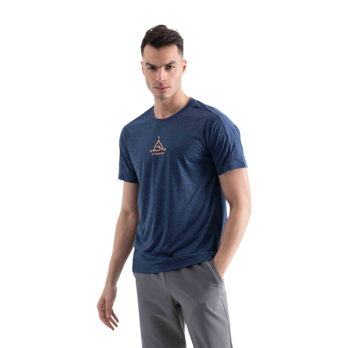 A man wearing a FRG blue heathered cross training t-shirt with an orange geometric logo on the chest.