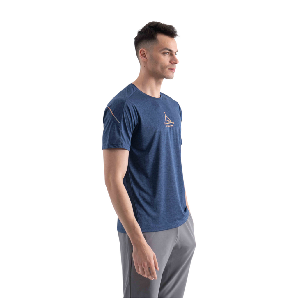 FRG blue cross training t-shirt with orange logo detail worn by a man against a white background