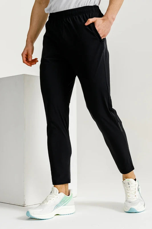 ANTA RUNNING textile trousers