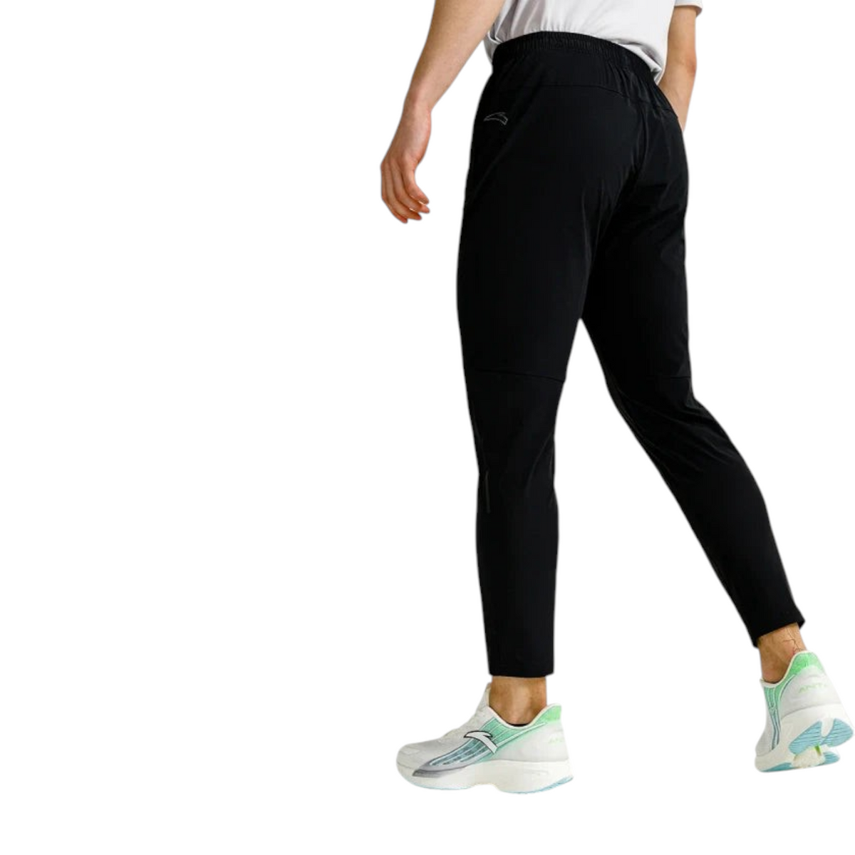 FRG ANTA lightweight black running trousers with reflective details and UV protection worn by a male athlete