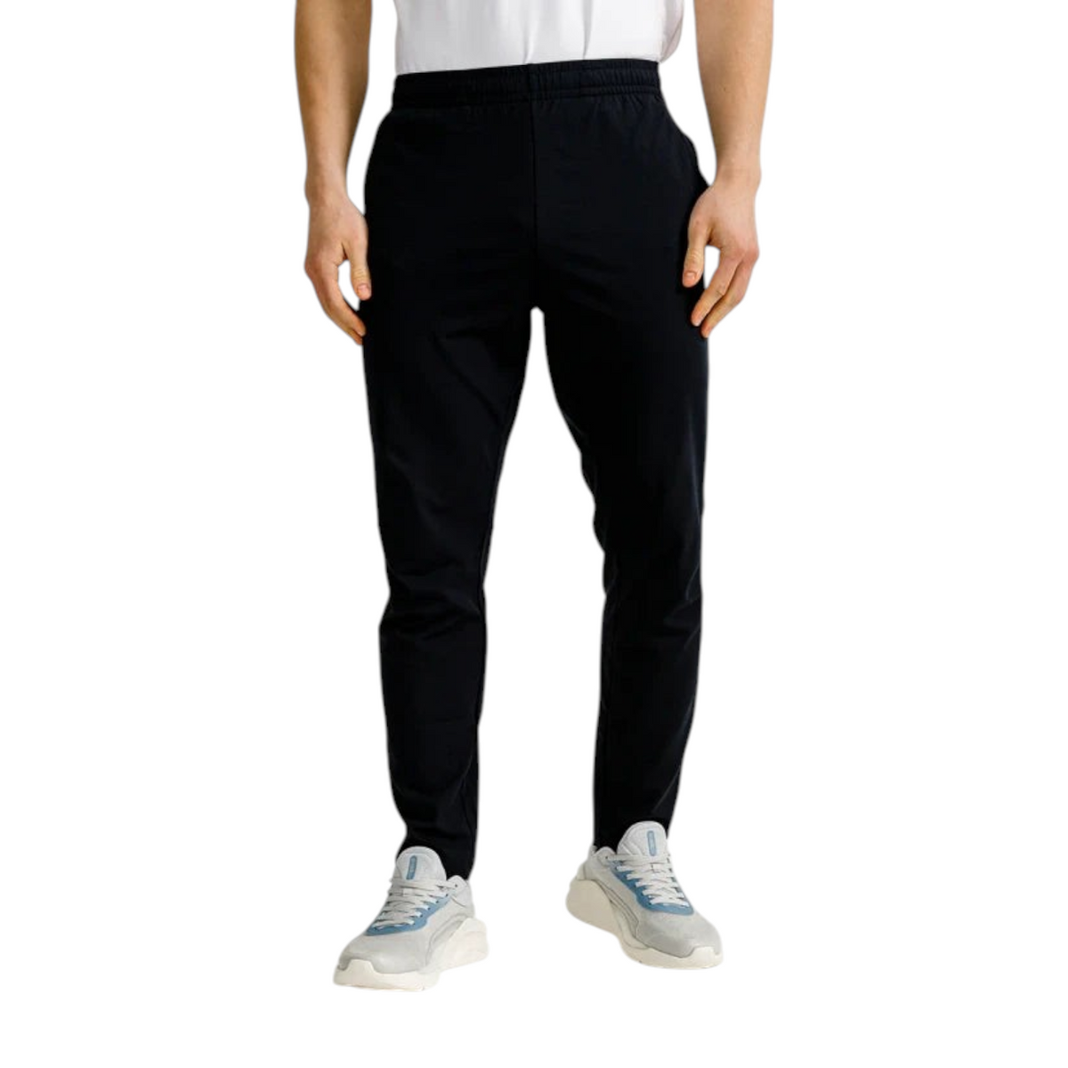 FRG Anta slim-fit black training trousers in Ecocozy fabric with wide elastic waist worn by a male model