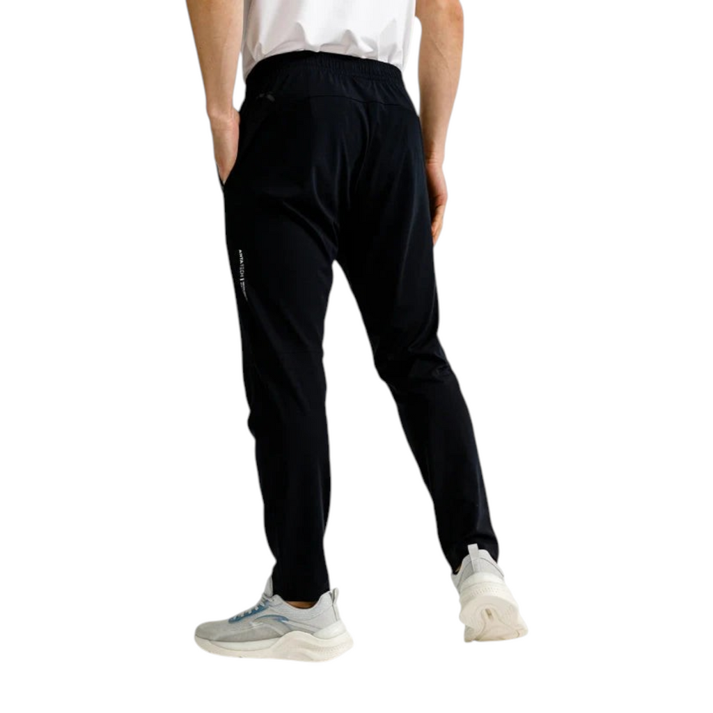 FRG Anta Training slim-fit black knit trousers with elastic waist and cooling fabric, back view on a male model