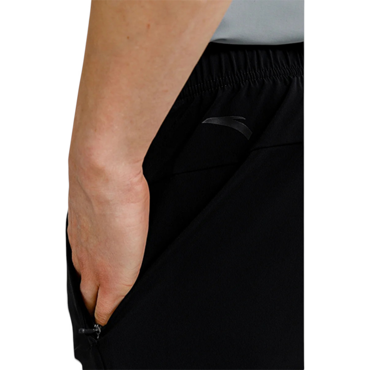 FRG Anta black knit fitness pants featuring a tapered fit, elastic waistband, and side zip pocket for men