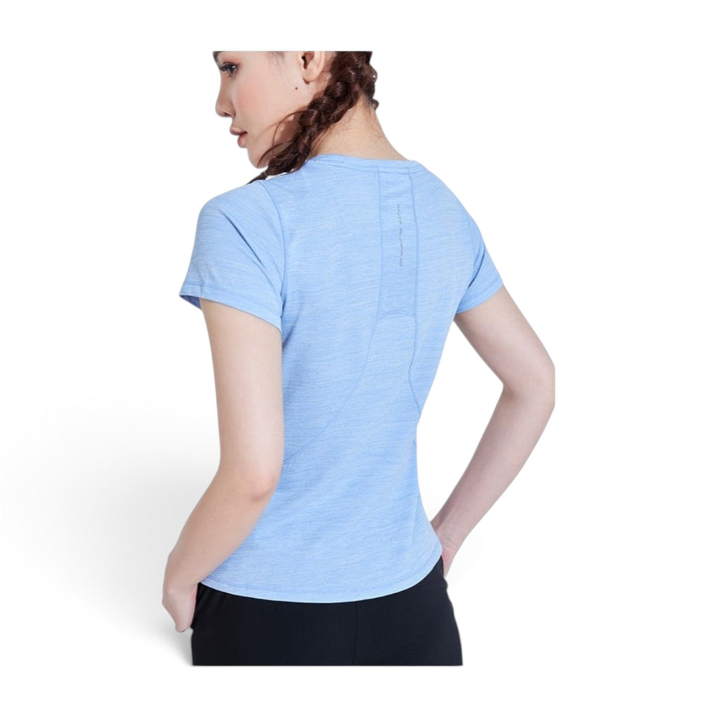 FRG light blue athletic t-shirt with a fitted design and back seam detail worn by a woman