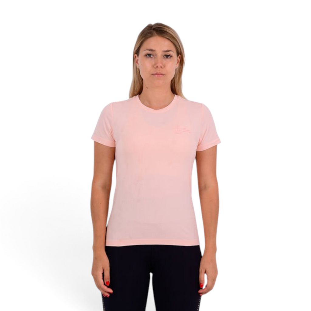 FRG regular fit light pink nylon and polyester blend t-shirt worn by a woman against a white background